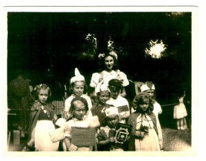 Hazel standing at back, Brenda on left, next to her with a white feather in her hat is Joan Hudston,     